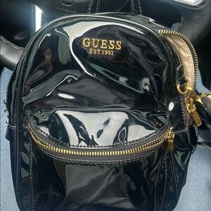 Guess Shiny Black Backpack with Gold Details